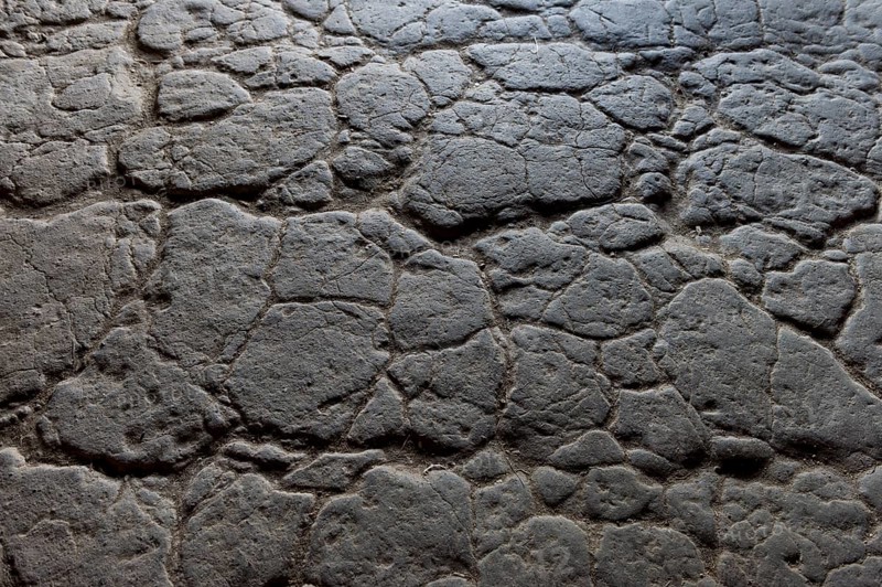 Stamped floor, detail, reconstructed courtyard with nine houses built by a large farmer from the Viking Age, Fyrkat Viking Farm, Hobro, Denmark