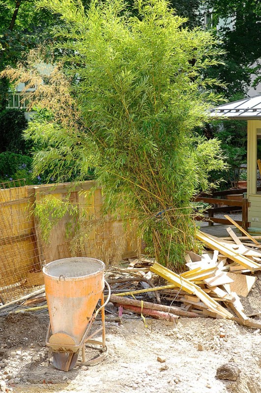 Equipment and wood scraps on a construction site