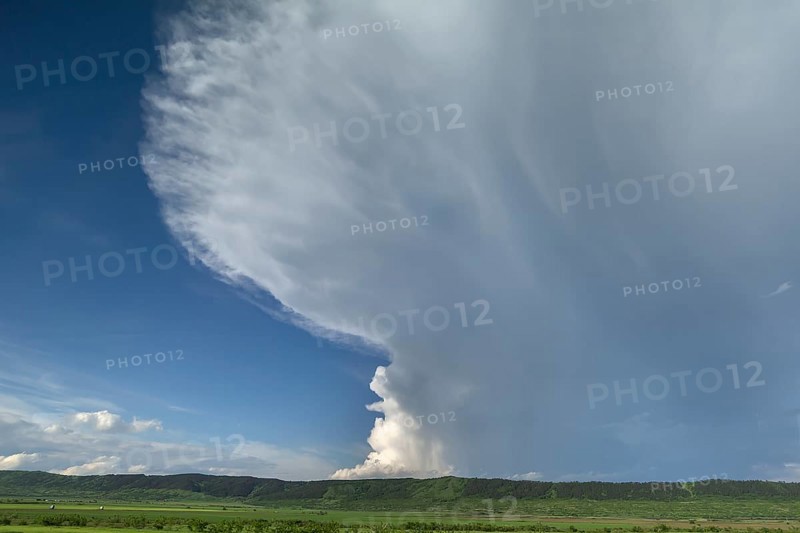 Landscape with approaching rain front (Nimbostratus), southern Carpathian Arc, Romania