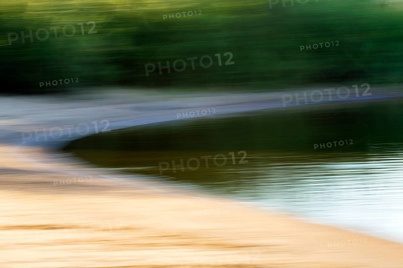 Riverbank with beach, minimalistic presentation, evening light, mopping effect, Lower Saxony Elbe floodplain, UNESCO Elbe River Landscape Biosphere Reserve, Lower Saxony, Germany