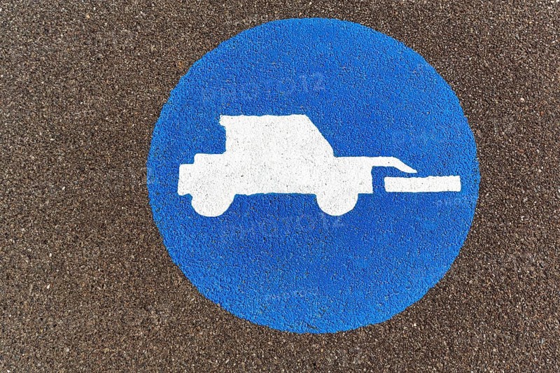 Tractor, front loader, pictogram on the asphalt, agricultural traffic, traffic signs on the dyke, Elbe cycle path, Lüneburg district, Lower Saxony