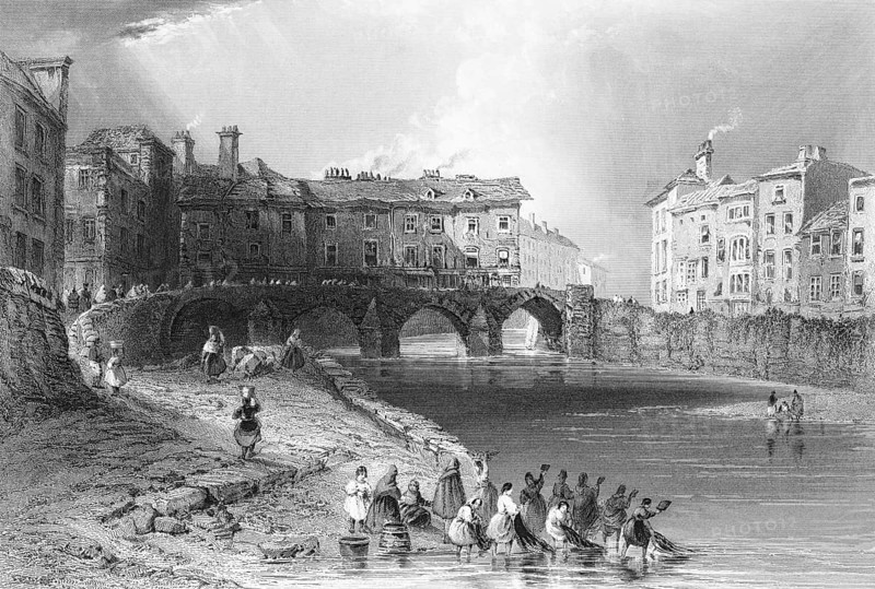 Bridge over the Shannon River in Limerick, woman fishing, Province of Munster, Ireland, city scene, arched bridge, smoking chimneys, row of houses, fortified bank, group of woman, landing net, basket, landmark, steel engraving, 19th century, historical illustration from 1845