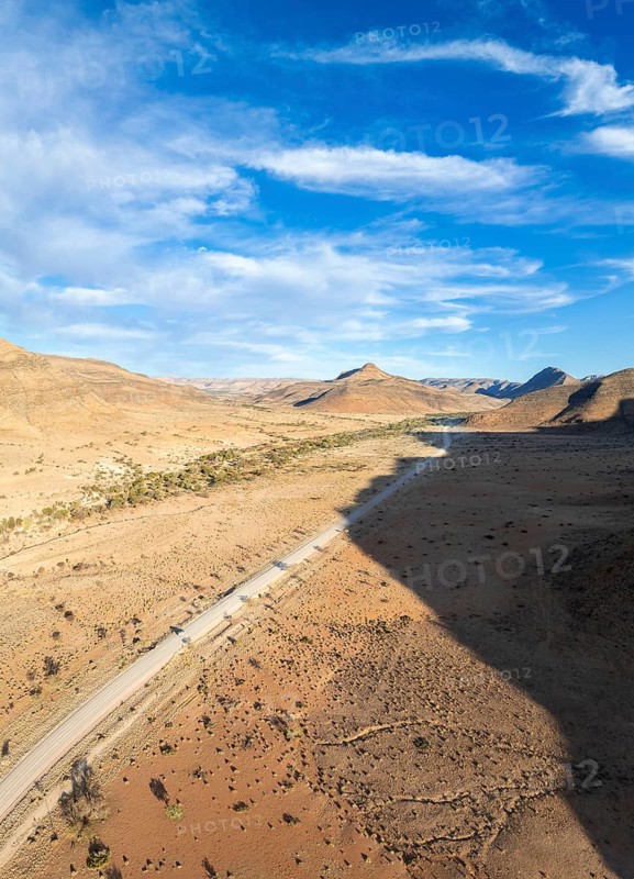 Aerial view, Eternally long straight road, road C14 through the Naukluft Mountains, desert and dry mountains, Namibia