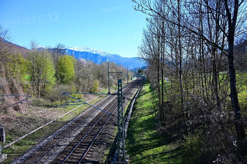View from a bridge on railroad tracks and the Alps, Oberaudorf, Bavaria, Germany