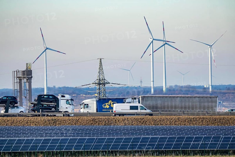 86.5 MW peak open space photovoltaic systems, from RWE, with over 141, 000 solar modules, on a side strip, over 1 km long, along the A44 motorway near Bedburg, at the Jackerath triangle, recultivated open-cast mining site, wind farm north of Titz, North Rhine-Westphalia, Germany