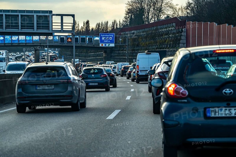Driving on the A40 motorway, Ruhrschnellweg, in heavy traffic, drivers' perspective, Bochum, North Rhine-Westphalia, Germany