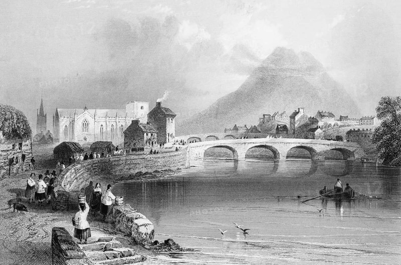 Ballina in the Moy Valley, County Mayo, Ireland, small town idyll, two arched bridges, seawall, street, gothic church, steeple, rowers, seagulls, mountain, people, basket, transportation, landmark, steel engraving, 19th century, historical illustration from 1845