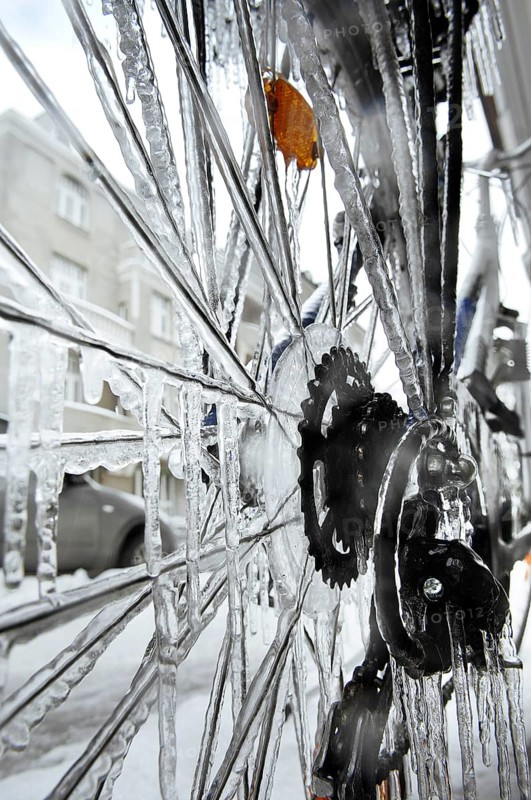 Bicycle icy due to freezing rain, icicles, detailed view