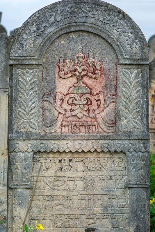 Coloured relief of a five-armed candleholder on a tombstone, Jewish cemetery, since 1866, Czernowicz, Bukovina, Ukraine