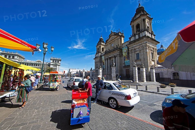 Street scene in the old town zone 1, in the back the cathedral or Catedral Metropolitana de Santiago de Guatemala, Guatemala City, Guatemala Department
