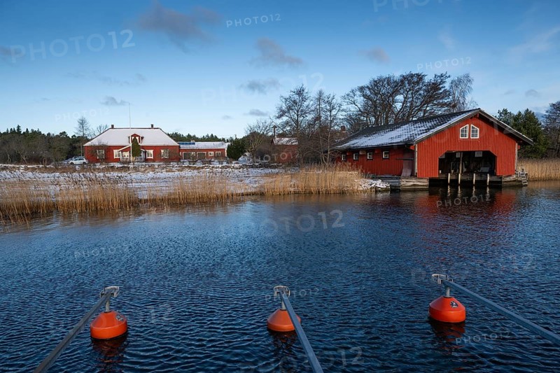 Falunred painted house and boathouse, Korpoström, Korpo or Korppo, southwestern archipelago, Finland