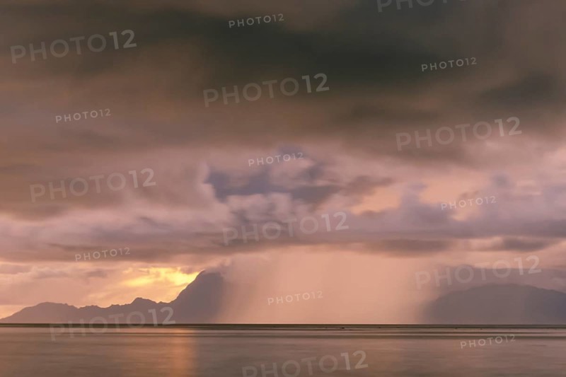 Tropical rain shower off Tahiti, Franz. polynesia