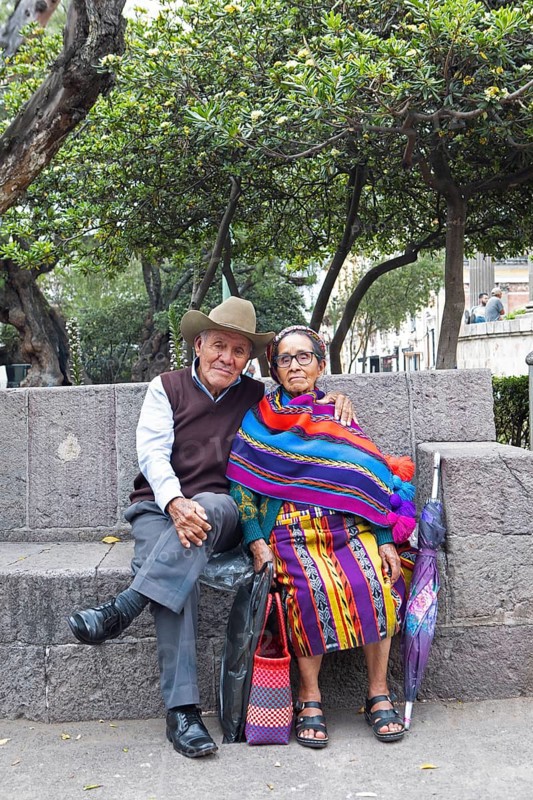 Elderly Guatemalan couple in traditional clothing, Parque Centroamérica or Parque Central, Quetzaltenango or Xela, Quetzaltenango Province, Guatemala