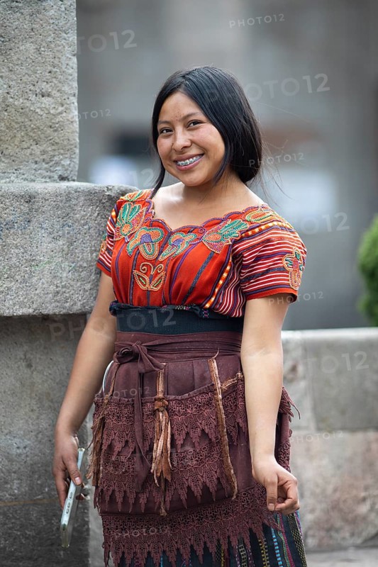 Mayan woman of the K'iché people in traditional dress, portrait, Parque Centroamérica or Parque Central, Quetzaltenango or Xela, Quetzaltenango Province, Guatemala