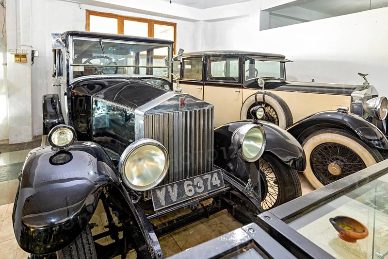 Black classic cars in a museum room, polished look, early automotive history design, classic car in the temples of Colombo in Sri Lanka