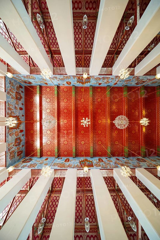 Frog's-eye view: Ubosot (ordination hall) with columns (Sao) and richly decorated ceiling (Phra Phimarn) and crystal chandeliers, Rattanakosin architecture (Bangkok style), Wat Chana Songkhram, Phra Nakhon, Bangkok, Thailand