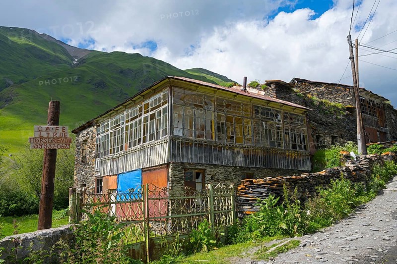 Rustic house on a mountainside under a cloudy sky, traditional house, Ushguli, Shibiani district, Zhibiani, Upper Svaneti, Svaneti, Georgia