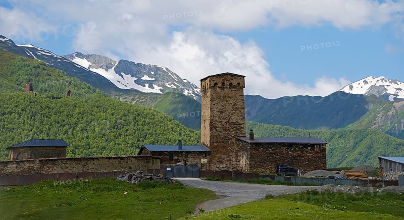 Wehrturm in the mountains against cloudy sky, Lamaria Church, Ushguli, Ushguli, Upper Svaneti, Svaneti, Georgia