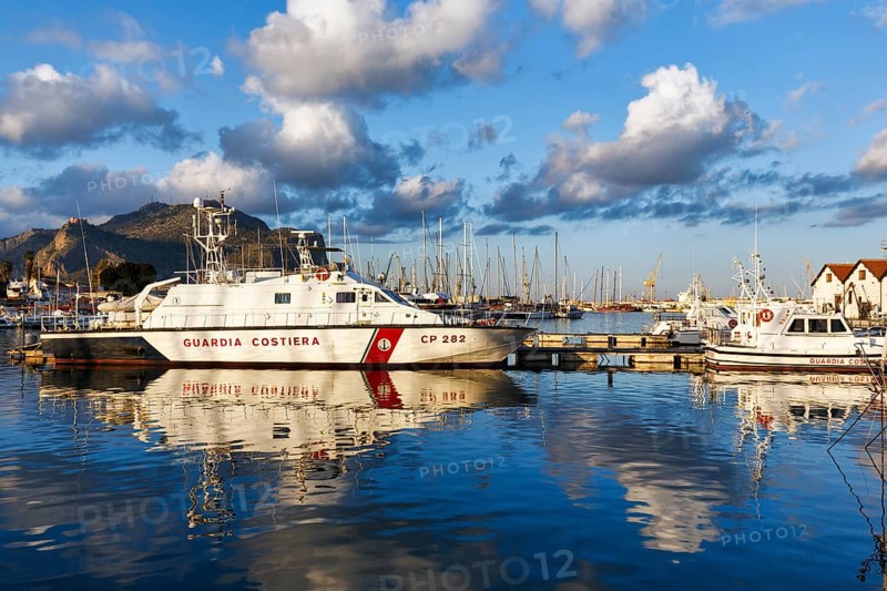 Italian Coast Guard patrol boat CP 282, sailboats, coastal landscape, marina, Marina La Cala in the evening light, Palermo, Sicily, Italy