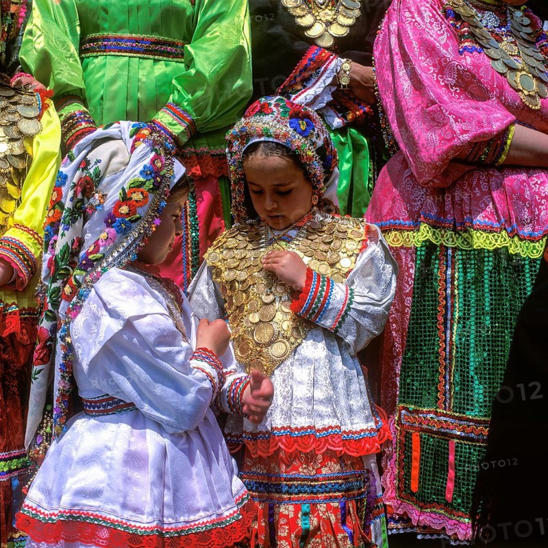 Kanakaries (girl) with gold jewellery made of gold coins, Easter Tuesday (Lambri Tritti), Olymbos, Karpathos, Dodecanese Islands, Greece