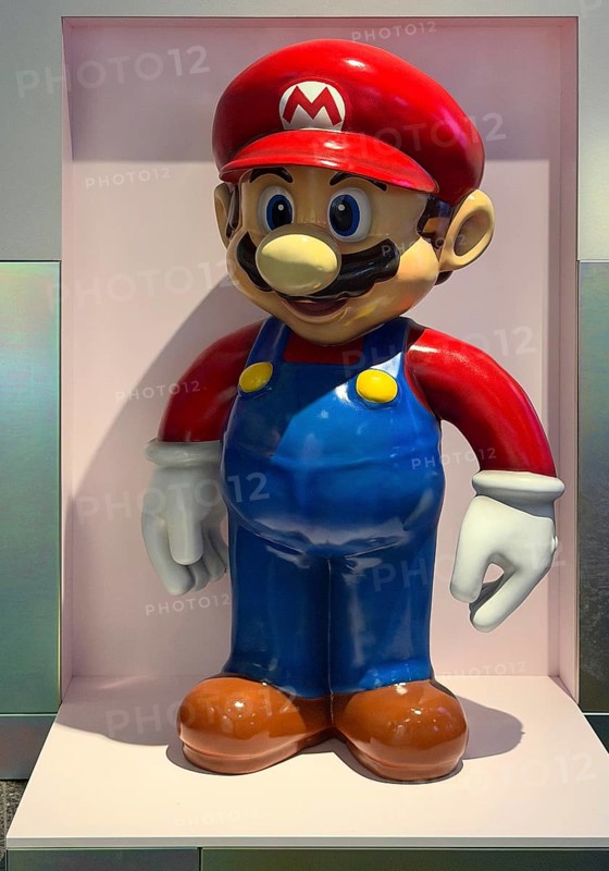 Figure of Super Mario, the icon of Nintendo game consoles, makes the leap onto mobile phones in 2016, House of History, Bonn, Germany