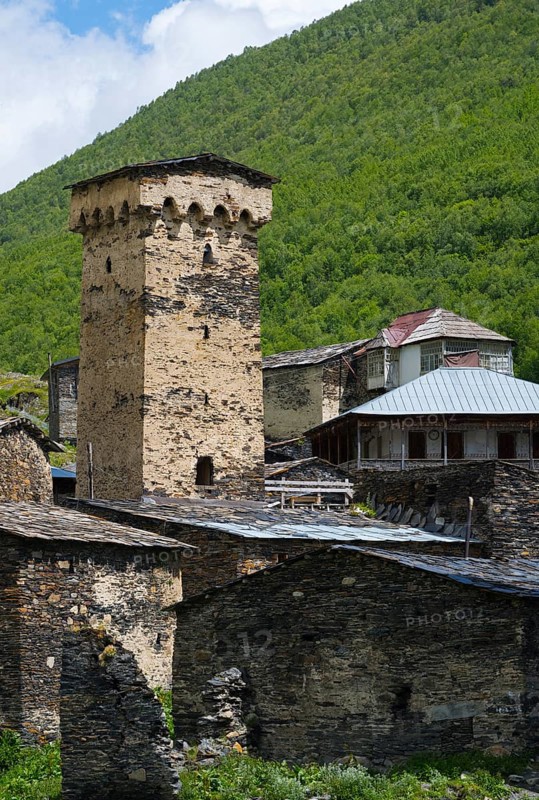 Historic stone building with a high tower in a green mountain valley, defensive towers, Ushguli, Ushguli, Chazhashi district, Mingrelia region and Upper Svaneti, Svaneti, Georgia