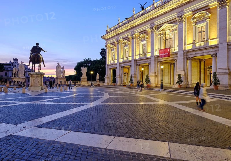 Equestrian statue of Marcus Aurelius and illuminated Palazzo Nuovo at the blue hour, Piazza del Campidoglio on Capitoline Hill, Capitol Square, Rome, Lazio, Italy