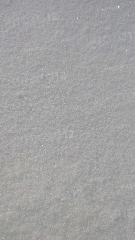 Close-up view of sparkling fresh snow covering a smooth surface, Franconian Forest