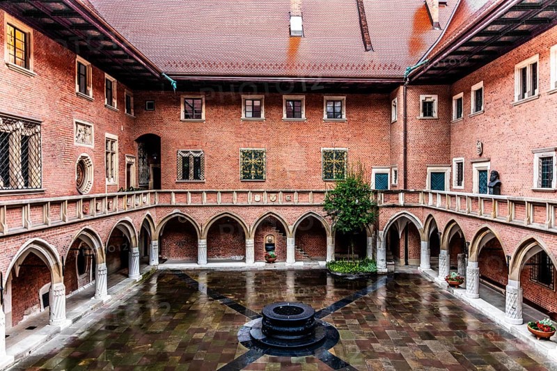 Arcade courtyard with fountain, Collegium Maius oldest building of the Jagellonian University, 1364, Krakow, Poland