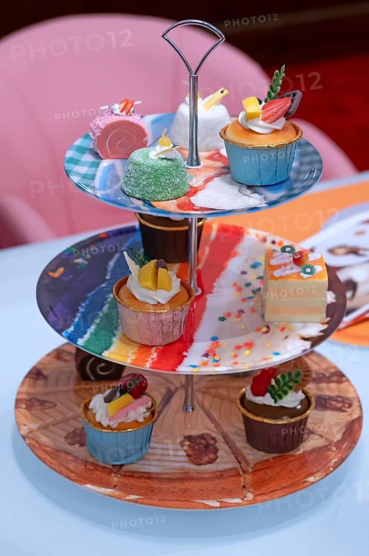Artificial cupcakes on a cake stand, England, Great Britain