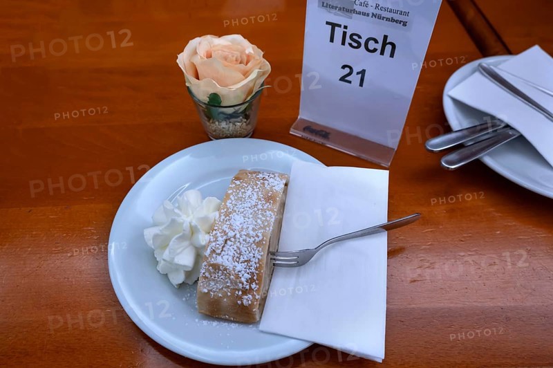 Apple strudel served with cream in a café, Nuremberg, Middle Franconia, Bavaria, Germany