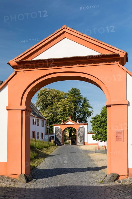 View through 2 gates at the entrance to St. Marienthal Abbey on the Neisse, Ostritz, Saxony, Germany