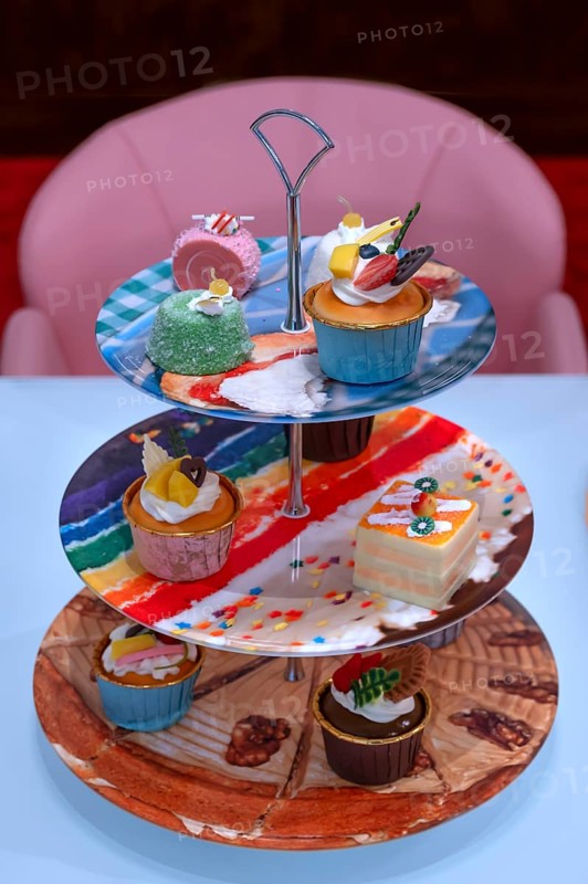 Artificial cupcakes on a cake stand, England, Great Britain