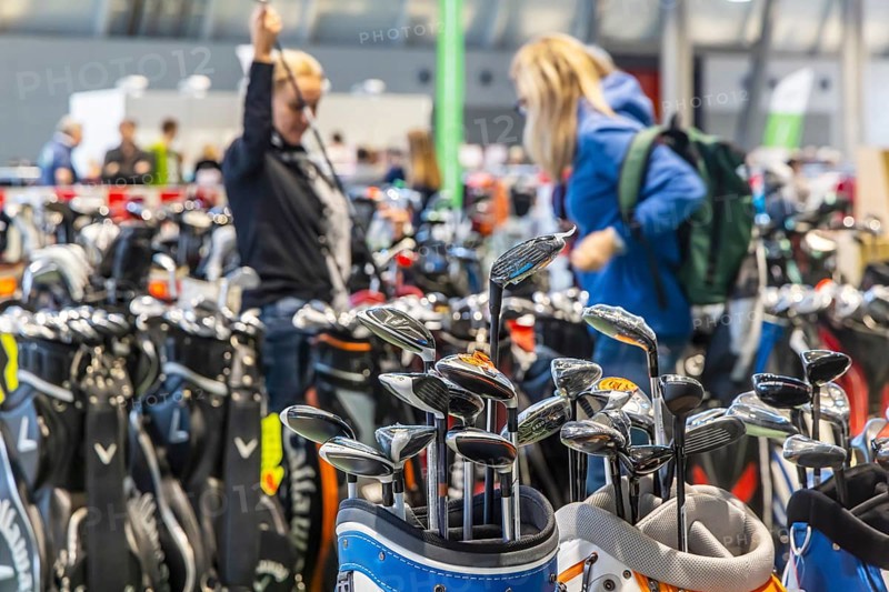 Presentation of golf clubs. Caravan — Motor — Tourism trade fair in Stuttgart. Stuttgart, Baden-Württemberg, Germany