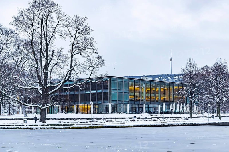 Exterior view of the state parliament building with Eckensee and television tower. Winter in Stuttgart. The city is wintry white early in the morning. Stuttgart, Baden-Württemberg, Germany