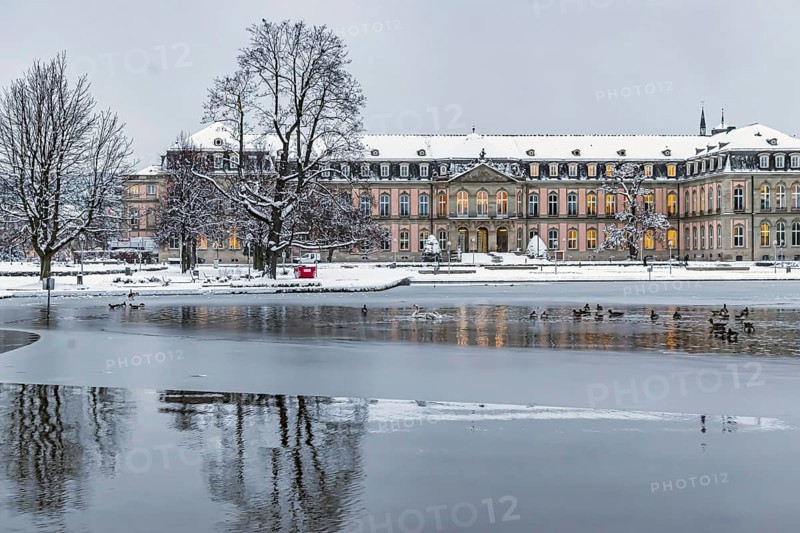 New castle with Eckensee. Winter in Stuttgart. The city is wintry white early in the morning. Stuttgart, Baden-Württemberg, Germany