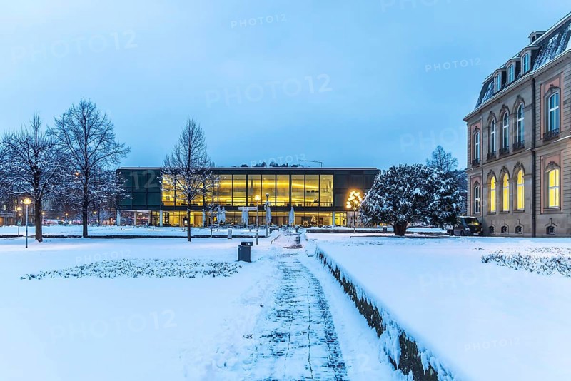 Exterior view of the state parliament building, the New Palace on the right. Winter in Stuttgart. The city is wintry white early in the morning. Stuttgart, Baden-Württemberg, Germany
