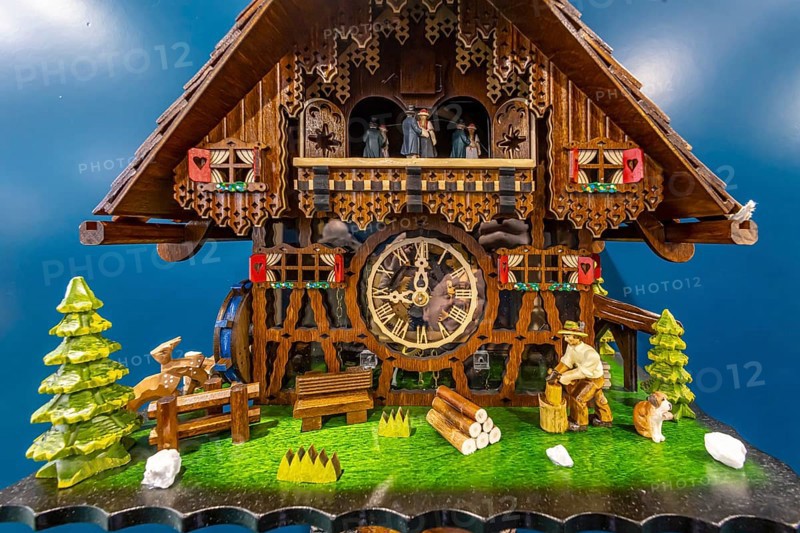 Cuckoo clock, exhibited at the CMT exhibition. This handcrafted watch is typical of the Black Forest. Stuttgart, Baden-Württemberg, Germany