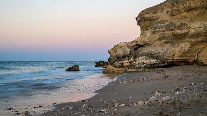 Sunrise on the coast near Mirbat, Oman
