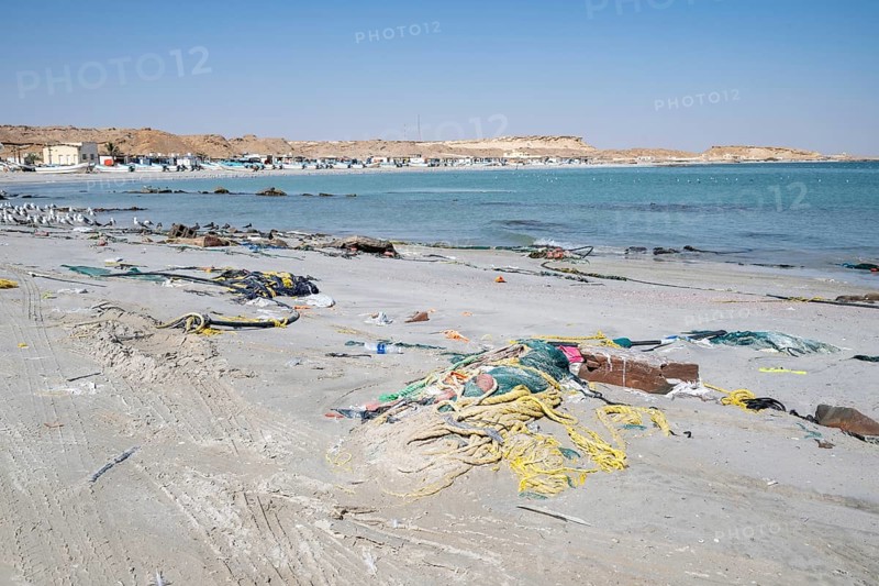 Garbage, fishing nets and plastic on the beach, Oman