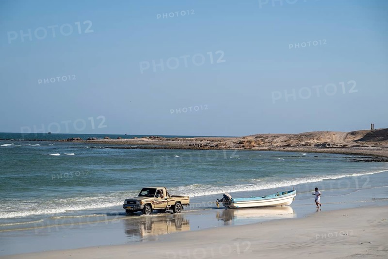 Car pulls fishing boat into sea, Oman