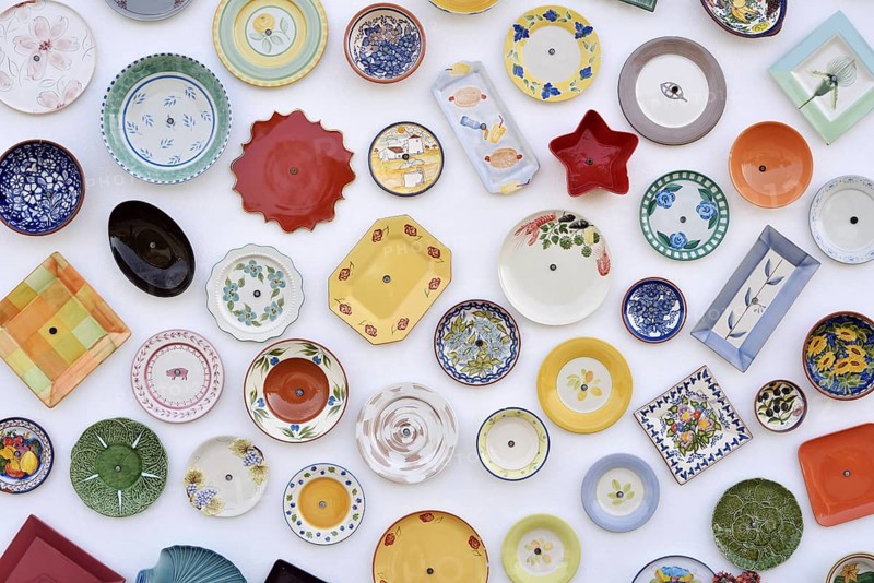 House wall with traditionally painted ceramic plates, Vila do Bispo, Algarve, Portugal