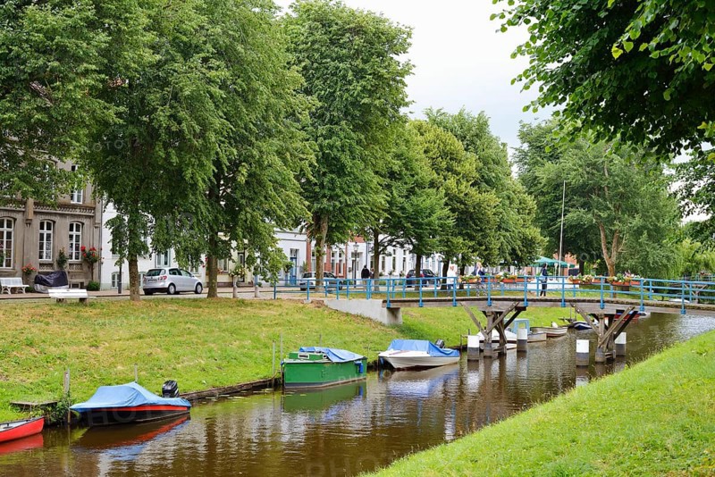 Canal with boats, 'Little Amsterdam of the North' Friedrichstadt, North Frisia, Schleswig-Holstein, Germany