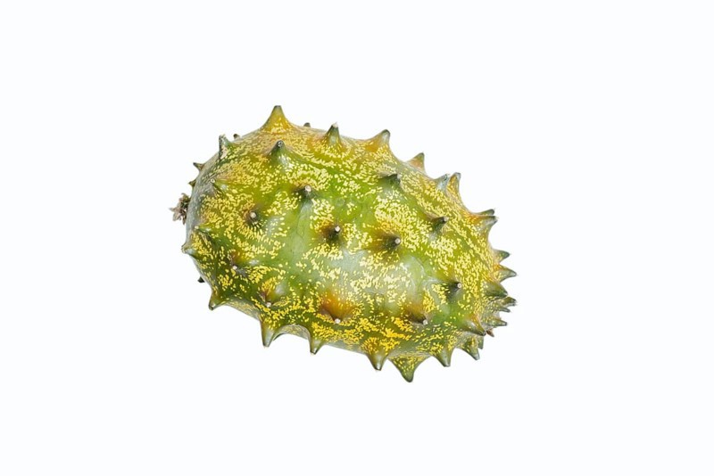 Horned cucumber, kiwano or horned melon (Cucumis metuliferus), fruit on a white background, native to Africa
