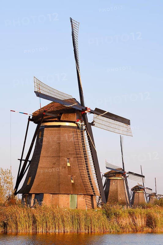 Historic windmills in the evening light, UNESCO World Heritage Site, Kinderdijk, South Holland, Netherlands