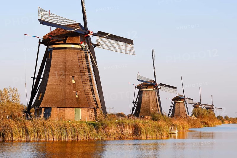 Historic windmills in the evening light, UNESCO World Heritage Site, Kinderdijk, South Holland, Netherlands