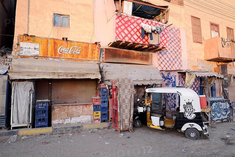 Shops and tuk-tuk, Esna, Egypt