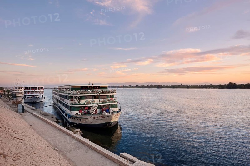 Nile cruise ships at sunrise at the pier in Esna, Egypt