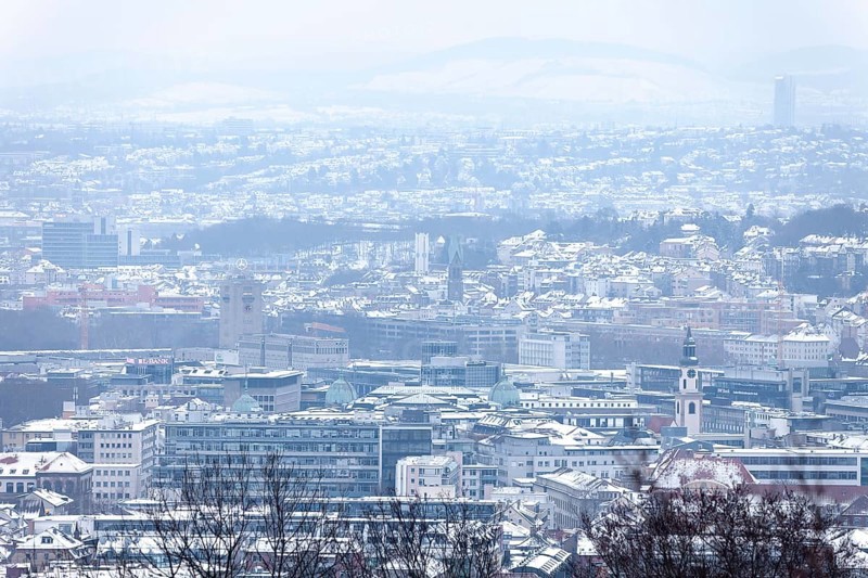 March 18, 2018, winter view with snow toward city center with station and tower from Mount Scherbelino, Stuttgart, Baden-Württemberg, Germany