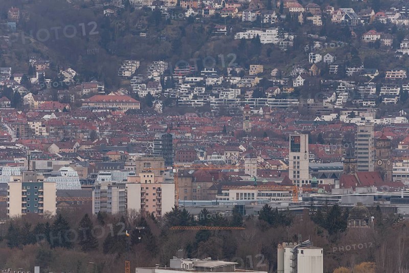 30.03.2018: Zoomed view of city roofs, towers and industrial buildings. Stuttgart, Baden-Wuerttemberg, Germany